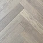 Herringbone Sand EIR 12mm AC-4