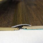 Trojan A14 Self-Adhesive Uni-Coverstrip - Walnut, 2.7m