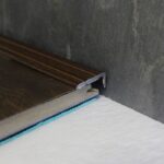 Trojan A31 Self-Adhesive Angle Edge 25x8mm - Walnut, 25m